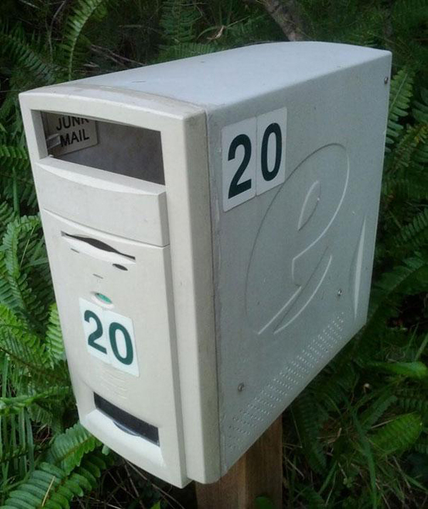 Old desktop computer tower repurposed as a mailbox