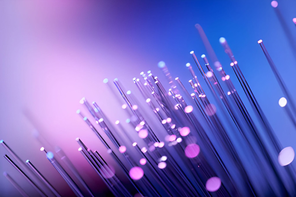 Glowing fiber optic strands with purple and blue light