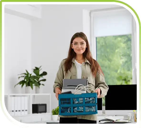 Woman holding a box filled with recycling materials, representing nationwide sustainability, recycling programs, and eco-friendly services.
