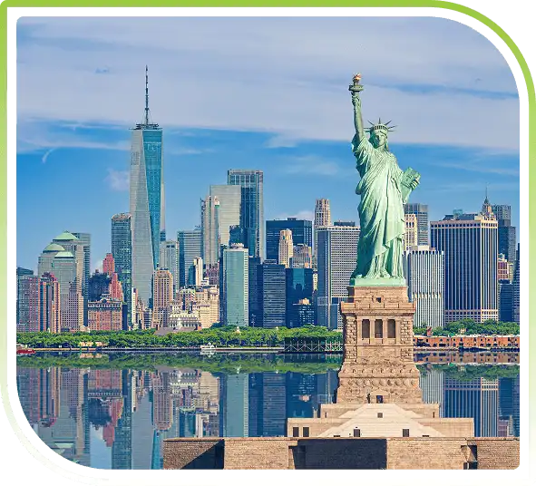New York City skyline featuring the Statue of Liberty in the foreground with modern high-rise buildings under a clear blue sky.